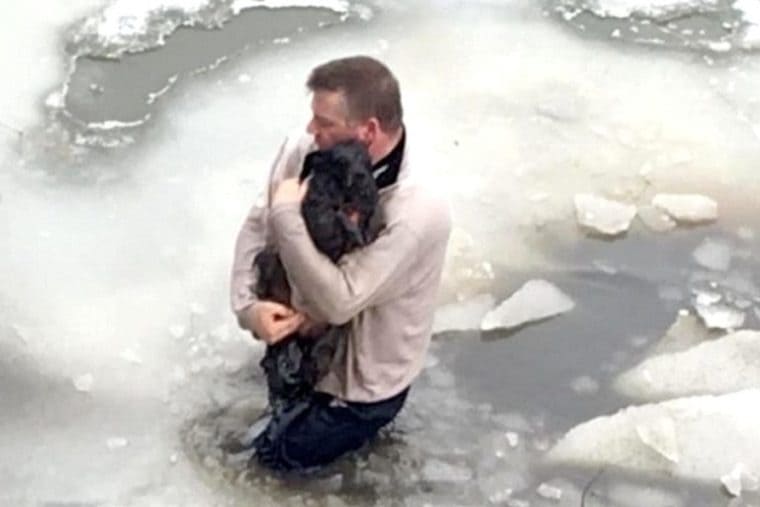 Man Risks His Own Life By Jumping Into Frozen River To Save Dog ...