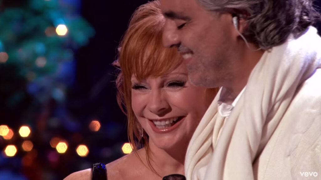 A Symphony of Voices – Andrea Bocelli and Reba McEntire’s Unforgettable “Blue Christmas”